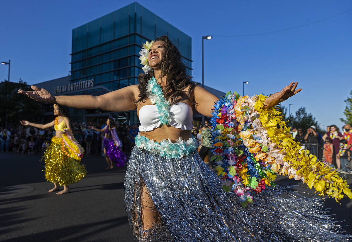 Dancers entertain the crowd during Lei Day, a new parade to celebrate and kick off Asian Pacifi ...