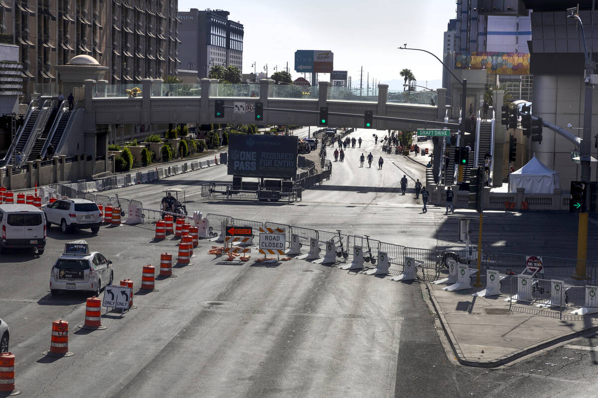 Mobile bollards block off the Las Vegas Strip during the third day selections for the 2022 NFL ...