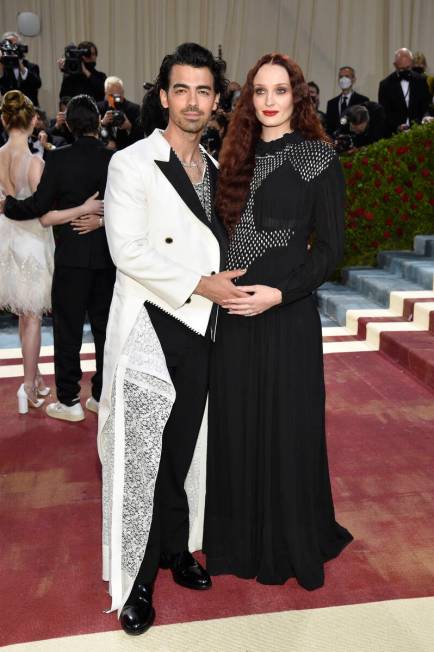 Joe Jonas, left, and Sophie Turner attend The Metropolitan Museum of Art's Costume Institute be ...