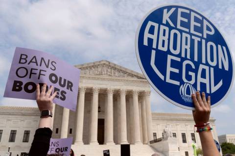 Demonstrators protest outside of the Supreme Court Tuesday, May 3, 2022 in Washington. (AP Phot ...