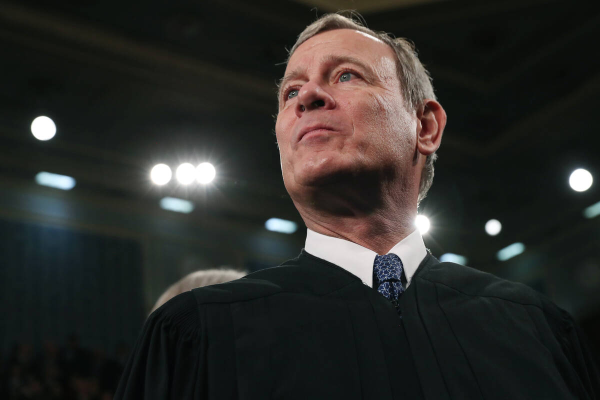 FILE - In this Tuesday, Feb. 4, 2020, file photo, Supreme Court Chief Justice John Roberts arri ...