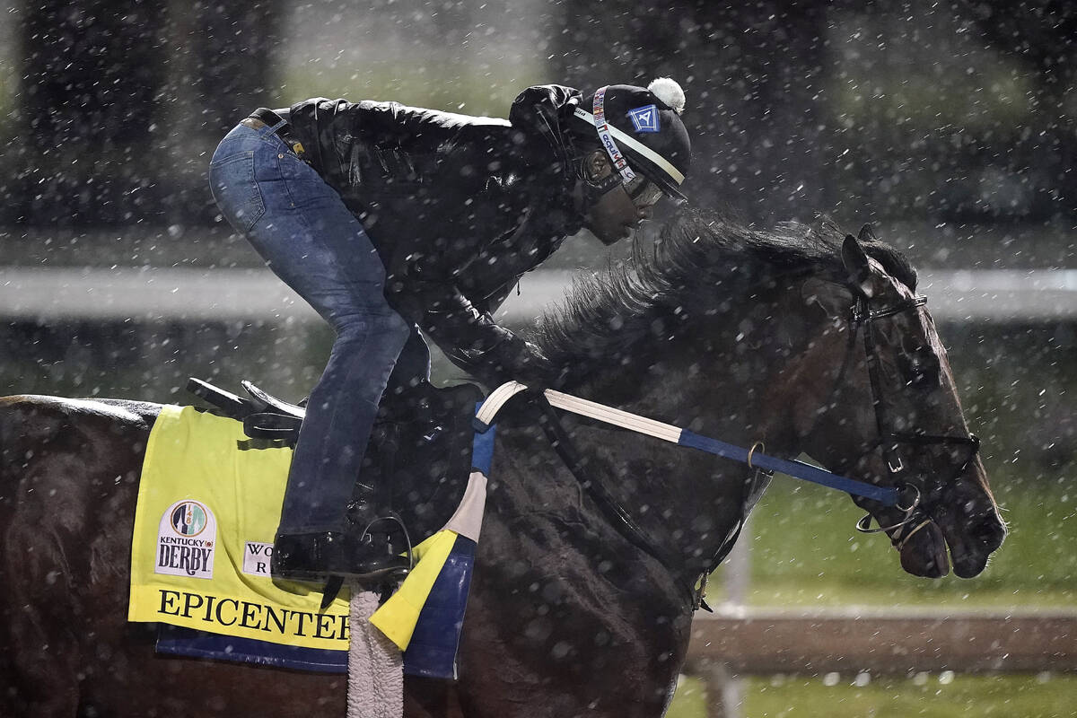Kentucky Derby entrant Epicenter works out in the rain at Churchill Downs Tuesday, May 3, 2022, ...