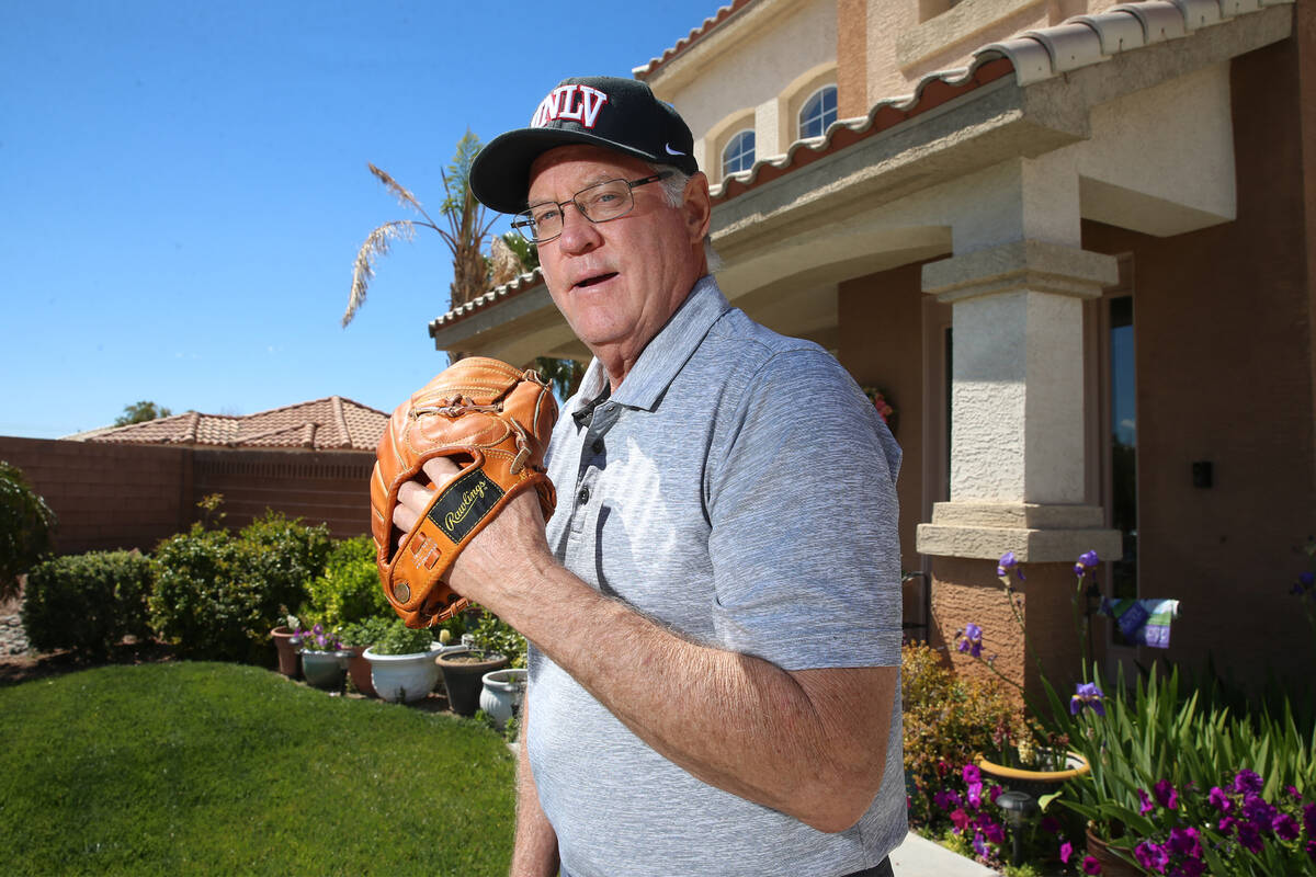 Mike Guerra is photographed with his Hank Bauer model glove at his Las Vegas home, Tuesday, Mar ...