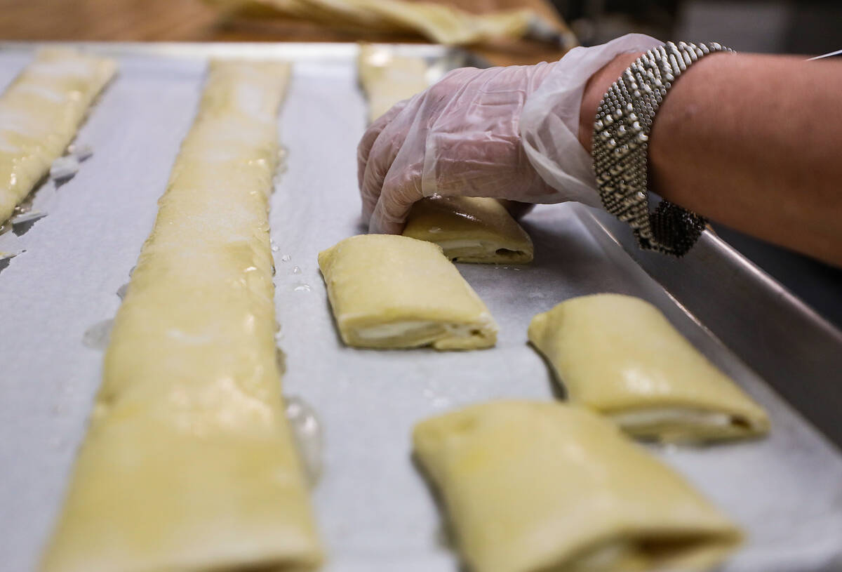 Owner Asmik Yetaryan makes cheese puffs at Van Bakery in Las Vegas, in Las Vegas, Thursday, Apr ...