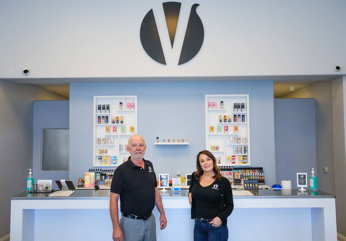 Owners Greg Belcher and Liz Whelan at one of their Vapeco locations in Las Vegas, Thursday, May ...