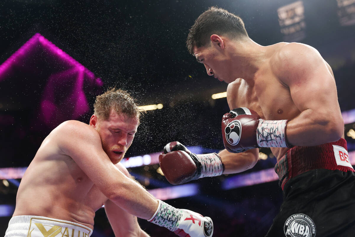 Dmitry Bivol connects a punch against Saul “Canelo” Alvarez in the ninth round of ...