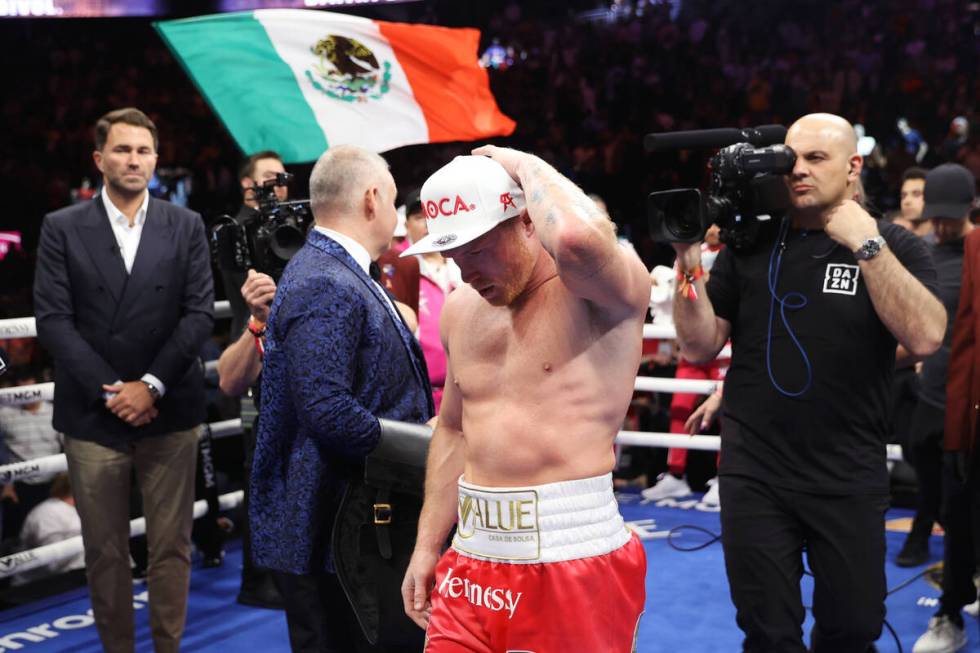 Saul “Canelo” Alvarez reacts after his unanimous decision loss against Dmitry Bivol in the ...
