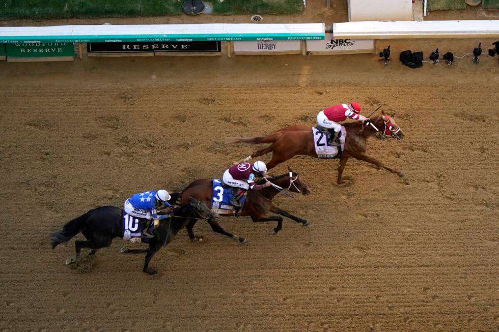 Rich Strike (21), with Sonny Leon aboard, beats Epicenter (3), with Joel Rosario aboard, and Za ...