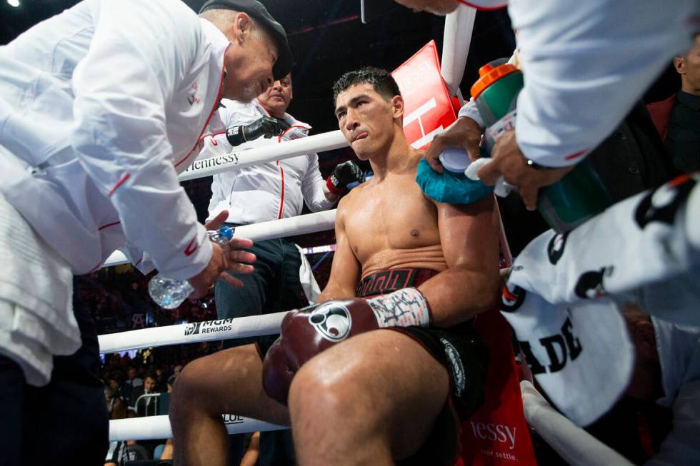 Dmitry Bivol sits on his corner in between rounds of the WBA super light heavyweight title bout ...