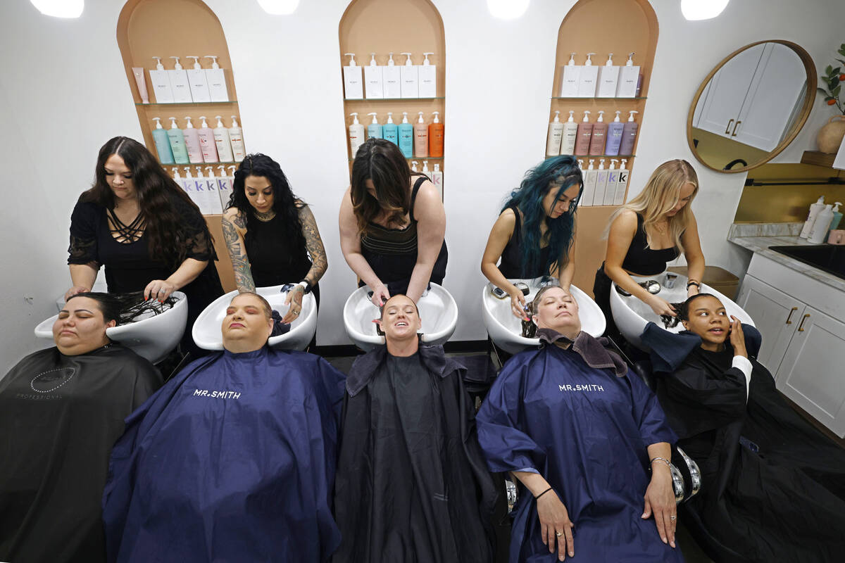 Abuse survivors receive hair services at Capelli Salon, Sunday, May 8, 2022, in Las Vegas. In h ...