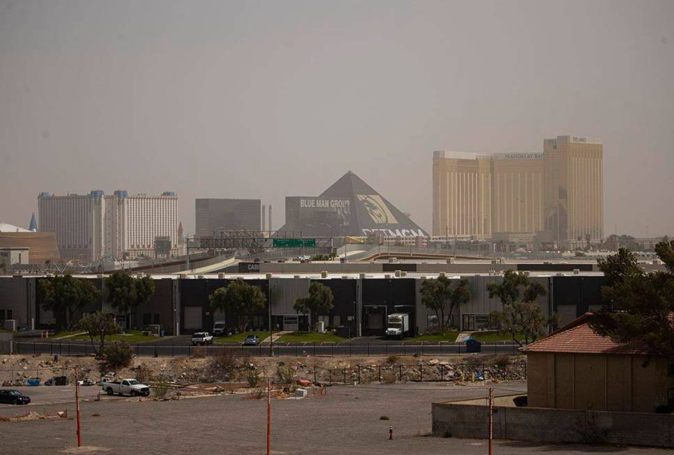 The sky is partially obscured as winds bring in a dust storm on Sunday, May 8, 2022, in Las Veg ...