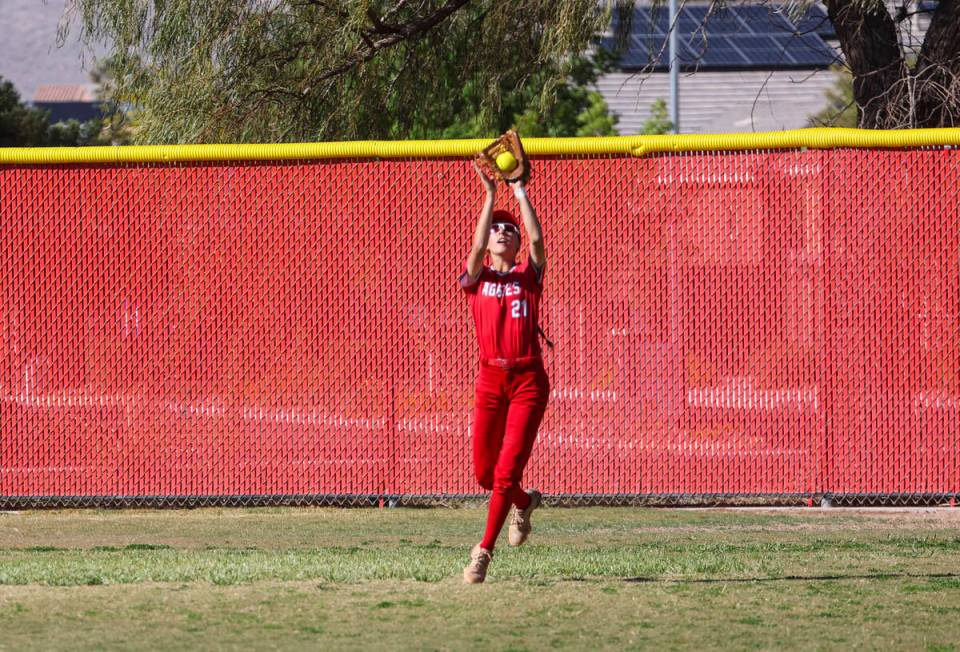 Arbor View's Micaela Resler (21) catches a fly ball from Centennial during a softball game in t ...