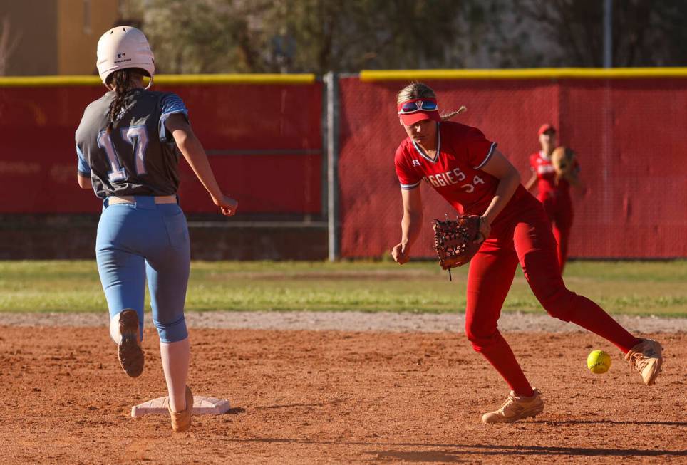 Centennial's Liliana Palmeri (17) heads for second base against Arbor View's Makena Strong (34) ...