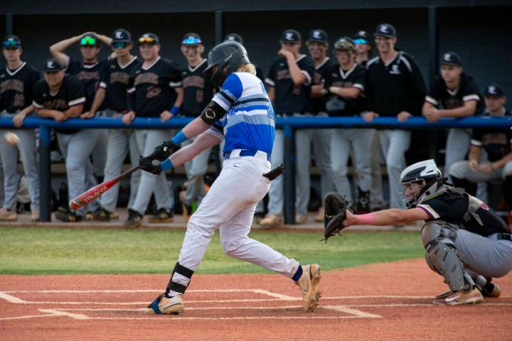 Basic’s third baseman Chase Ditmar (77) hits a grand slam during a Class 5A Southern Region h ...