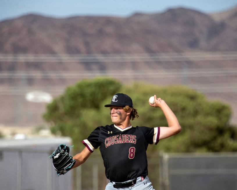 Faith Lutheran pitcher William Sullivan throws to Basic during a Class 5A Southern Region high ...