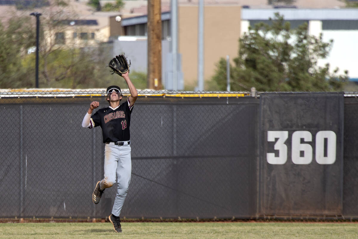 Basic outfielder Benjamin Lovering (18) makes a catch against Faith Lutheran during a Class 5A ...