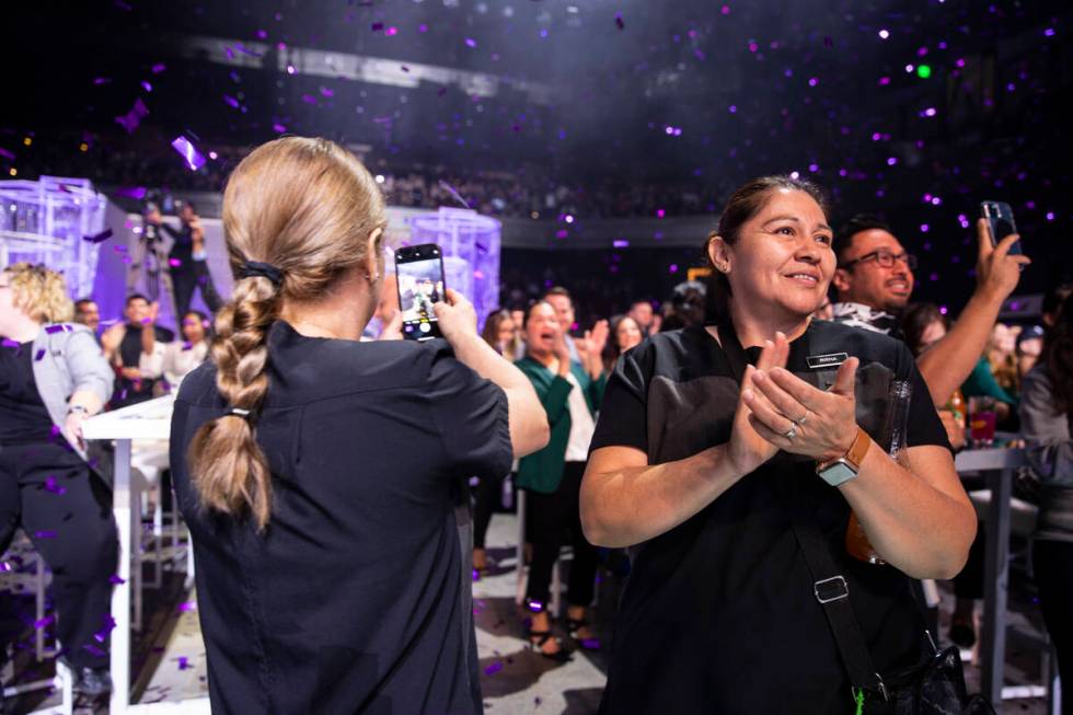 Mirna Hernandez, right, and Roxana Argueta, celebrate after the Cosmopolitan of Las Vegas annou ...