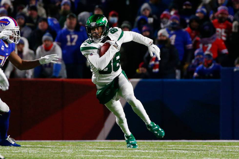 New York Jets wide receiver Keelan Cole (88) carries the ball during the second half of an NFL ...