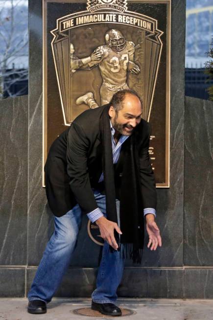 NFL Hall of Fame running back, Pittsburgh Steelers' Franco Harris stands on the spot where he c ...