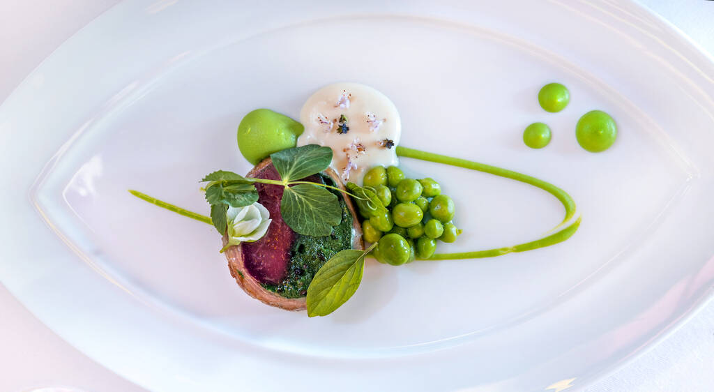 Colorado lamb saddle with English peas at Le Cirque restaurant within the Bellagio on Wednesday ...