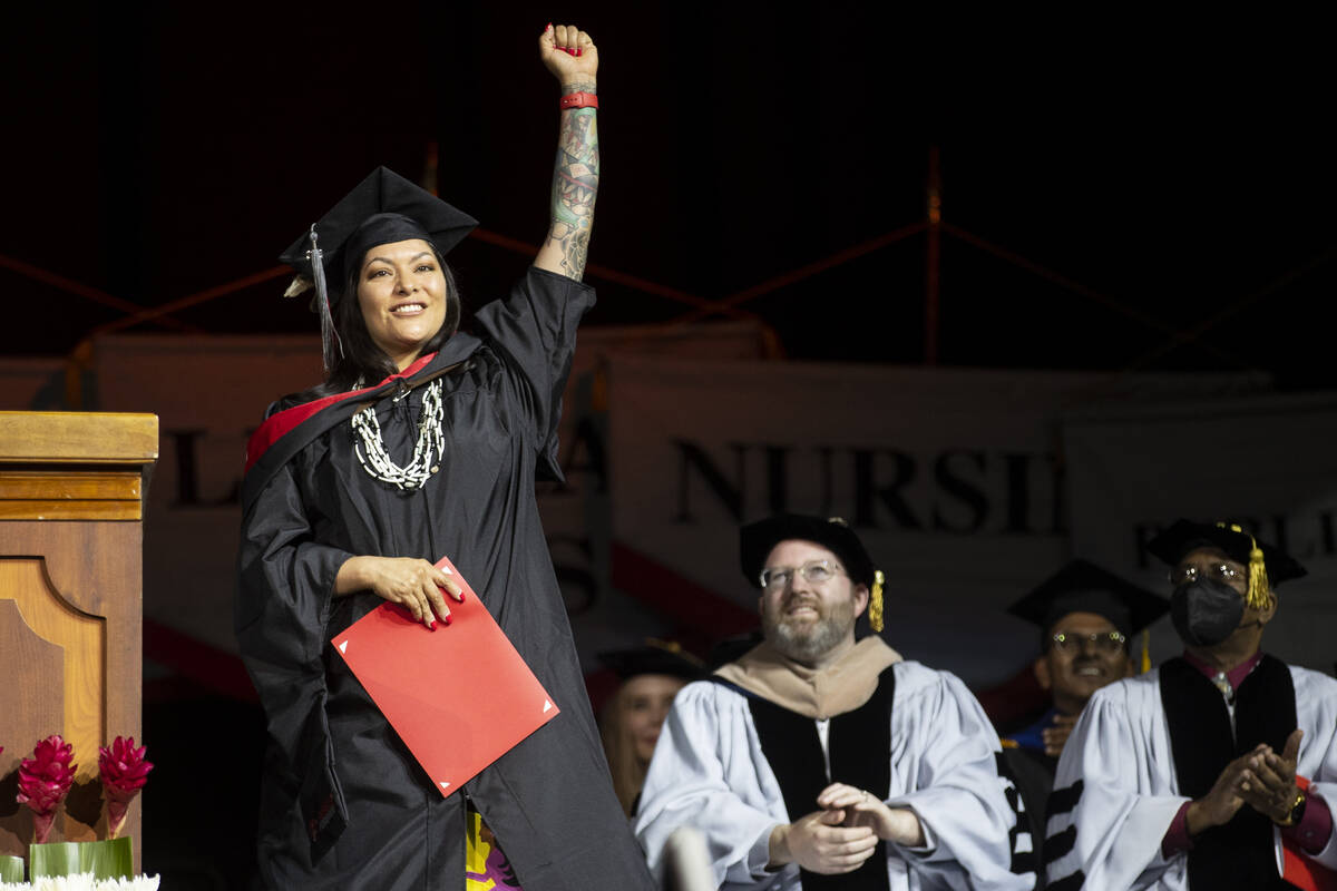Postgraduate Fawn Douglas is recognized during an UNLV commencement ceremony at the Thomas &amp ...