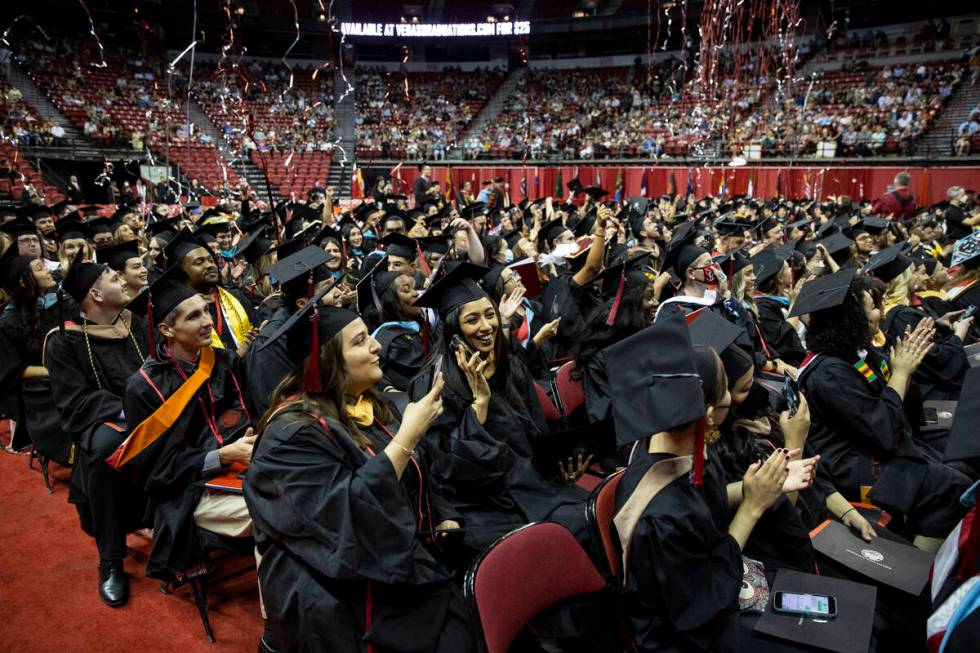 Postgraduates participate during an UNLV commencement ceremony at the Thomas & Mack Center ...