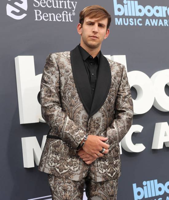 DJ Illenium poses on the red carpet for the Billboard Music Awards at the MGM Grand Garden Aren ...