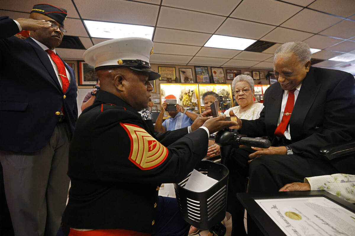 Henry Franklin Jackson, 96, right, receives a Congressional Gold Medal, from Master Sgt. Gregor ...