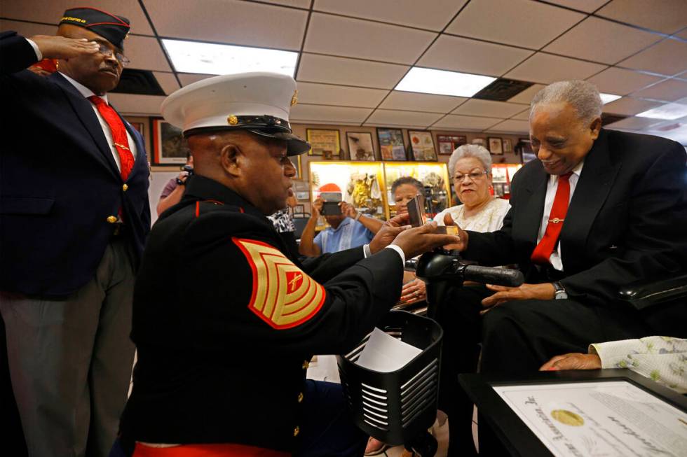 Henry Franklin Jackson, 96, right, receives a Congressional Gold Medal, from Master Sgt. Gregor ...