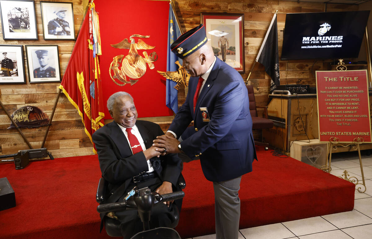 Henry Franklin Jackson, 96, left, of Las Vegas is congratulated by Gary White, president of the ...