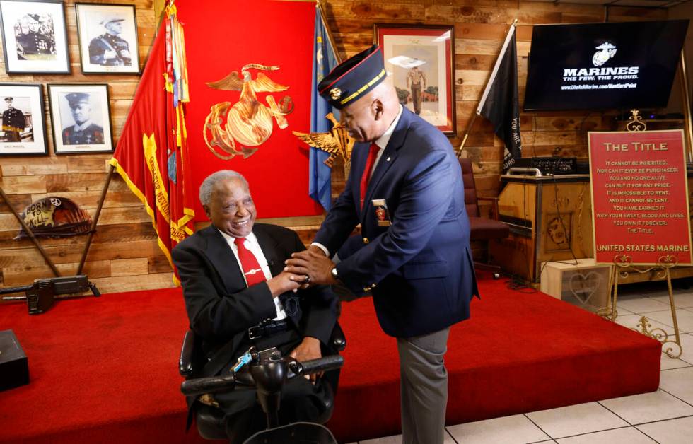 Henry Franklin Jackson, 96, left, of Las Vegas is congratulated by Gary White, president of the ...
