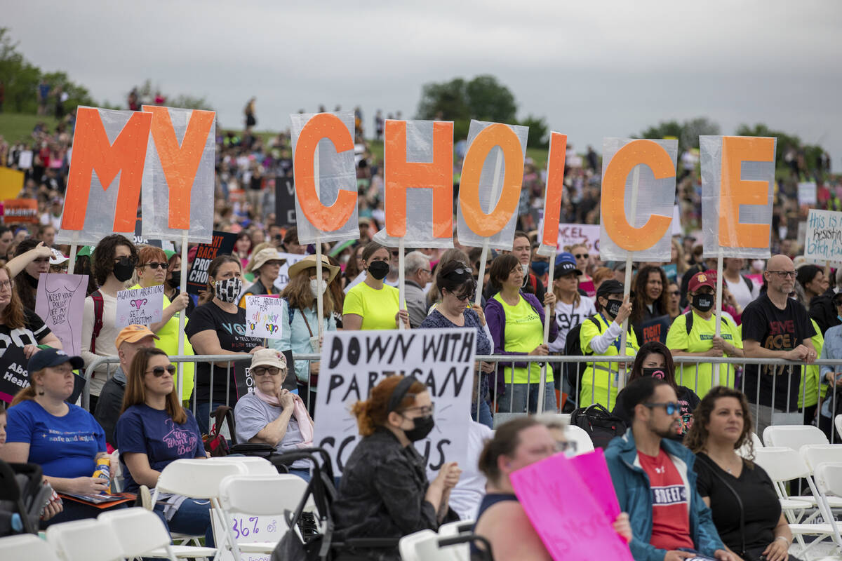 Abortion rights demonstrators rally, Saturday, May 14, 2022, on the National Mall in Washington ...