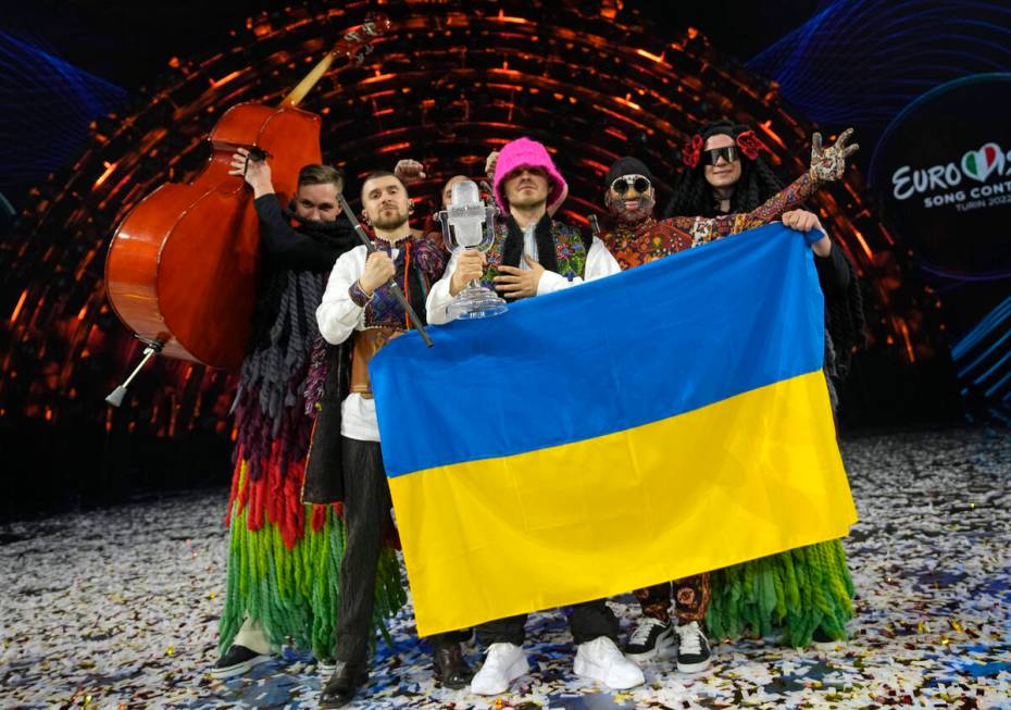 Members of the Kalush Orchestra from Ukraine celebrate after winning the Grand Final of the Eur ...