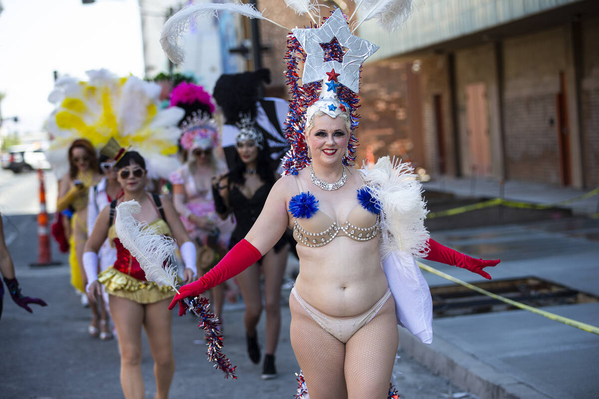 Entertainer Lolita Haze leads the Las Vegas Showgirl parade on Sunday, May 15, 2022, in downtow ...