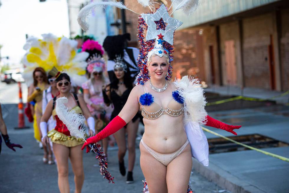 Entertainer Lolita Haze leads the Las Vegas Showgirl parade on Sunday, May 15, 2022, in downtow ...