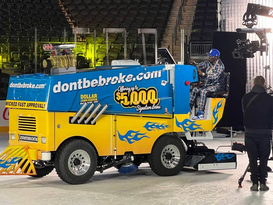 Flavor Flavor is shown driving the Zamboni during The Dollar Loan Center's new ad campaign on T ...