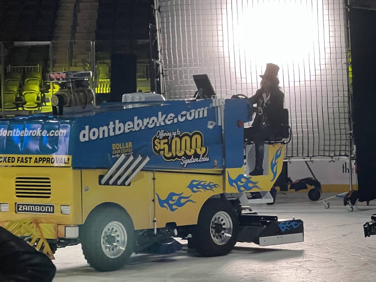 Alice Cooper is shown on video during a Zamboni ride for The Dollar Loan Center's new ad campai ...