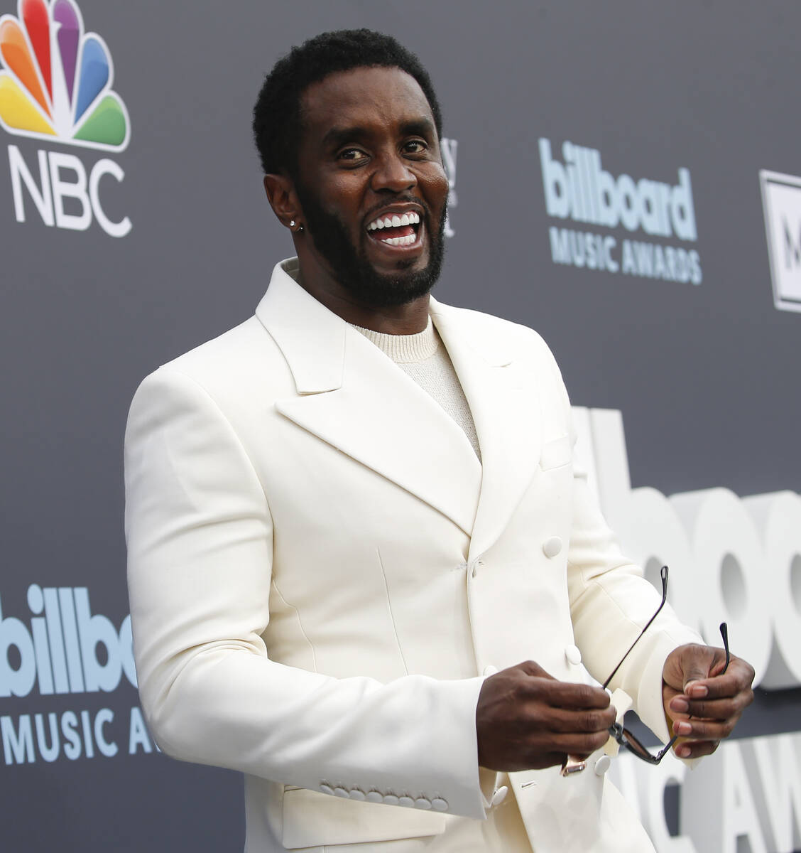 Sean ‘Diddy’ Combs reacts on the red carpet for the Billboard Music Awards at the ...