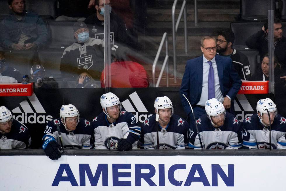 Winnipeg Jets head coach Paul Maurice watches his players during an NHL hockey game against the ...