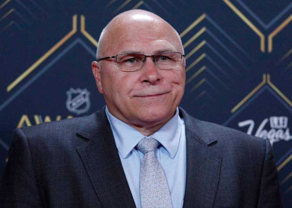 FILE - Barry Trotz of the New York Islanders poses on the red carpet before the NHL Awards, Jun ...