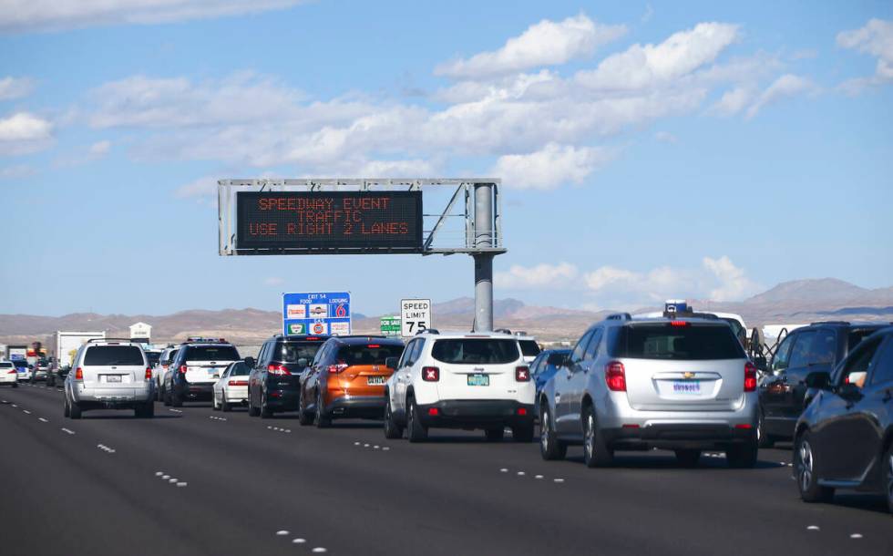 Traffic backs up on Interstate 15 as Electric Daisy Carnival attendees approach Speedway Boulev ...