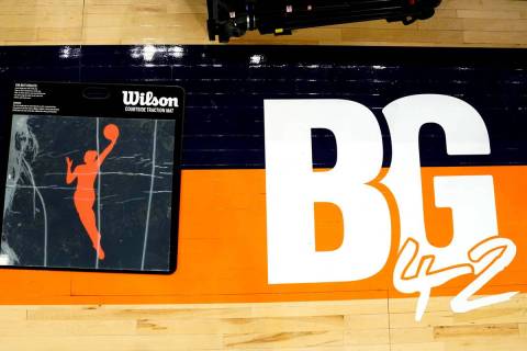 A floor decal in front of the scorer's table pays tribute to Phoenix Mercury's Brittney Griner ...