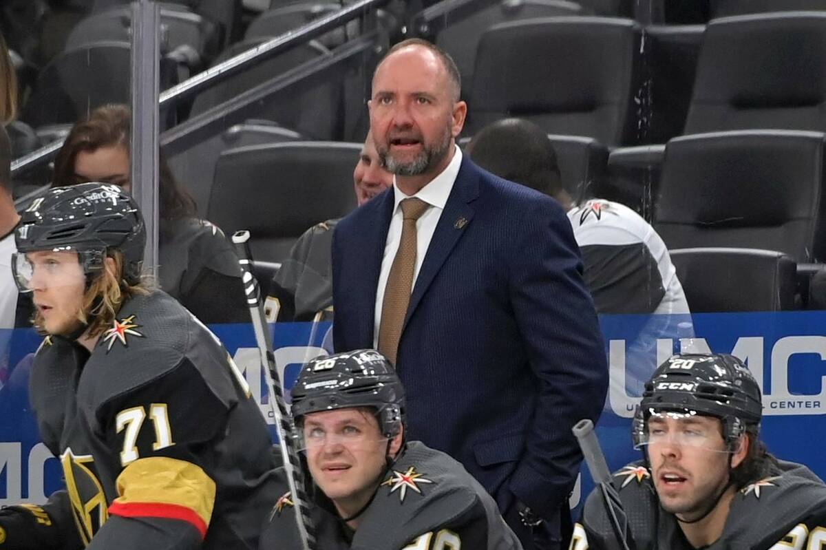 Vegas Golden Knights coach Peter DeBoer watches from the bench during the third period of the t ...