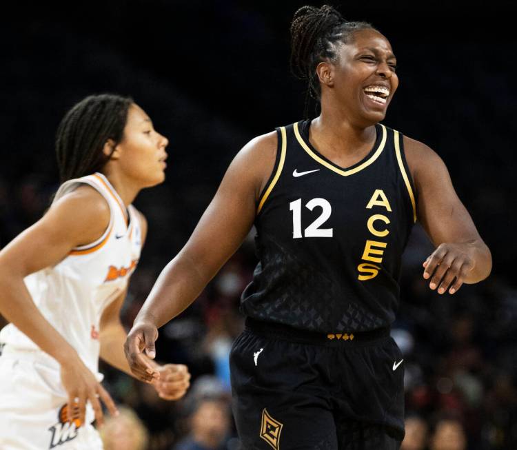 Aces guard Chelsea Gray (12) celebrates a big play in the second half during a WNBA basketball ...