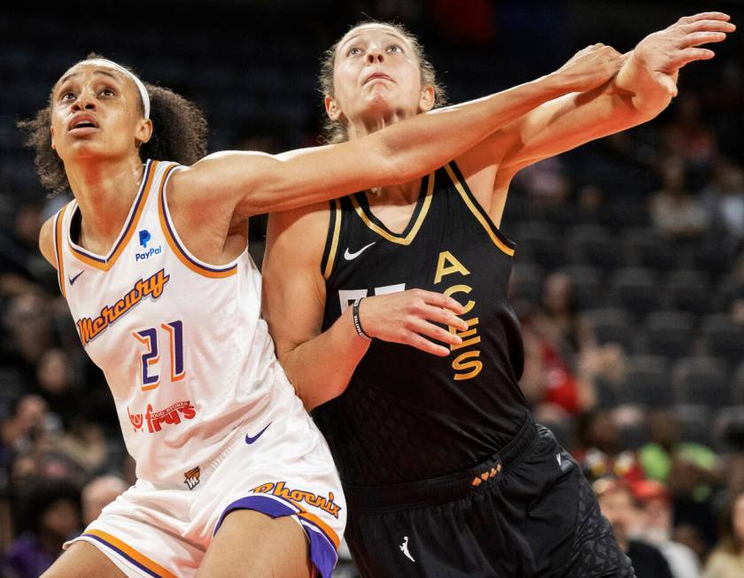 Phoenix Mercury forward Brianna Turner (21) boxes out Aces forward Theresa Plaisance (55) in th ...