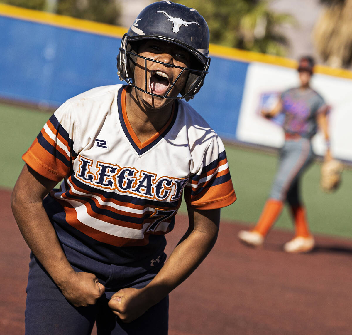 Legacy’s Jimena Barraza-Caro (7) gets fired up after hitting a triple during a Class 4A ...