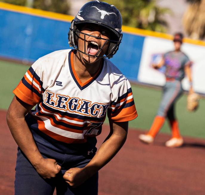 Legacy’s Jimena Barraza-Caro (7) gets fired up after hitting a triple during a Class 4A ...