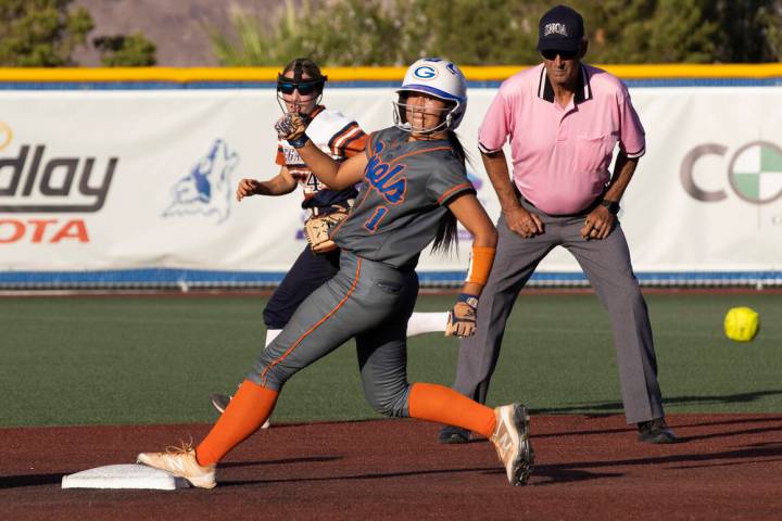 Bishop Gorman’s Chloe Makinney (1) beats the throw to second base in front of Legacy&#x2 ...