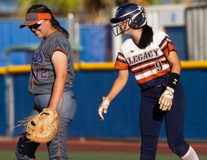 Bishop Gorman’s Jordyn Fray (12) shares a laugh with Legacy’s Madison Ruiz (9) during a Cla ...