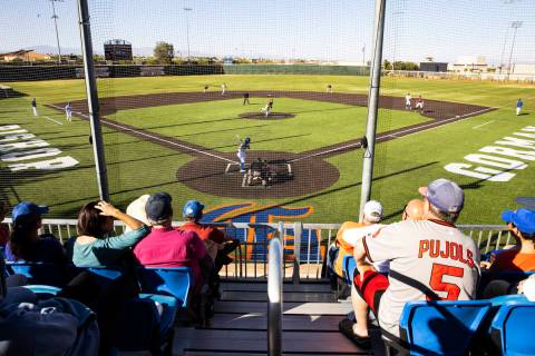 Fans watch a baseball game between Bishop Gorman High School and Coronado High during a playoff ...